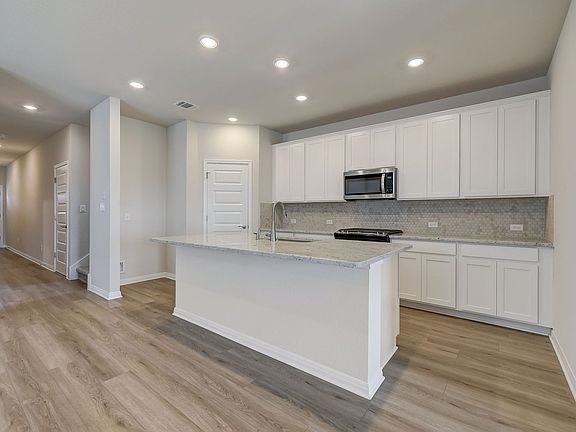 Cook your favorite meal in this beautiful kitchen.