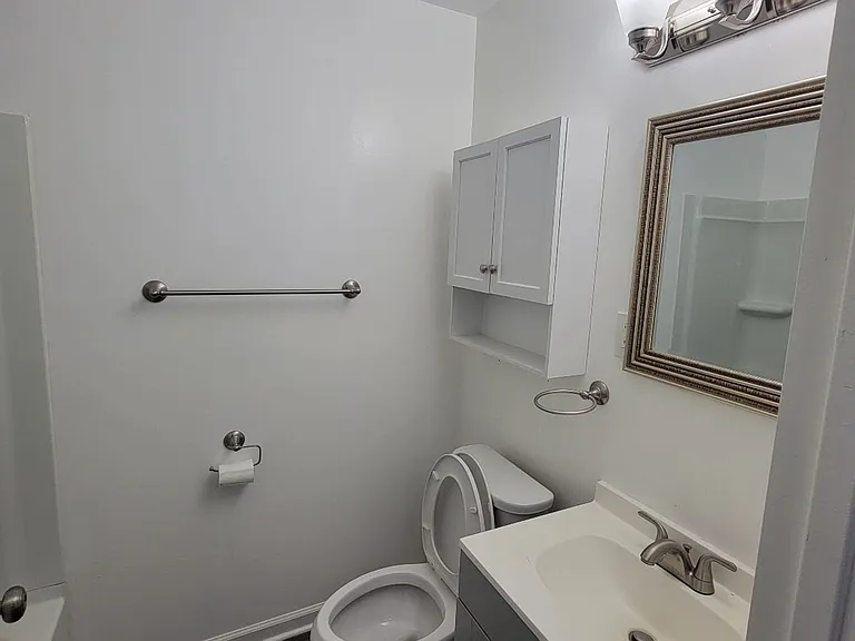 7703 Woolston Ave — Photo 7