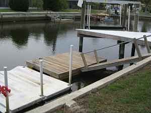 8000lb boat lift and 2 floating docks w/ramp