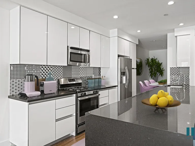 Kitchen with Energy-Efficient Refrigerator, Stove, Microwave Oven, and Dishwasher