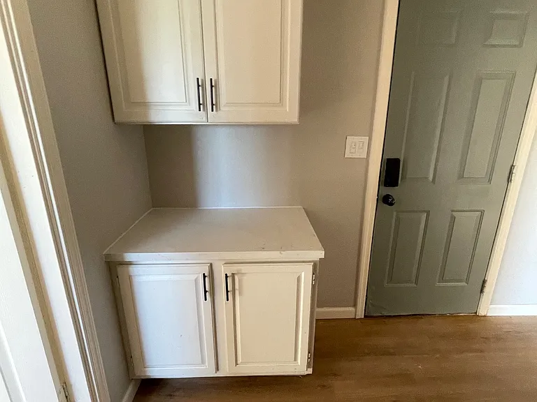 Hall Cabinets by Laundry area, West Hall