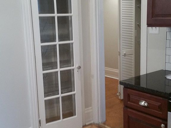 Large granite kitchen with pantry storage