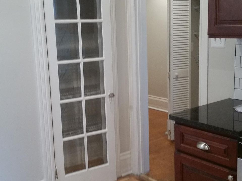 Large granite kitchen with pantry storage