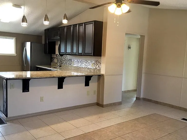 Living Room looking into the Kitchen