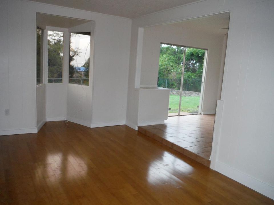 Living room into dining room. Note: floors are currently being renovated pictures to be updated soon.