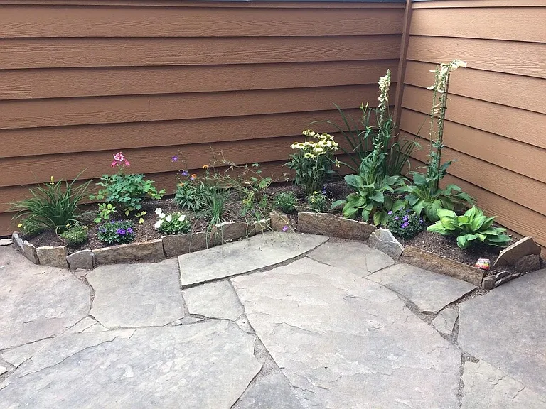 Cozy courtyard with a small garden.