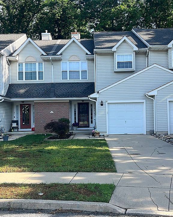 1 Car Garage Long Driveway