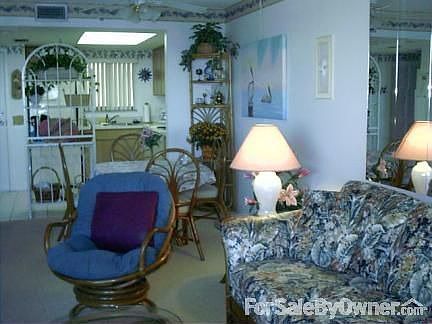 Inside Condo : View of living room, dining area and kitchen