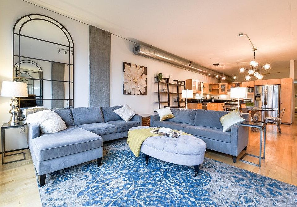view of living, dining and kitchen space