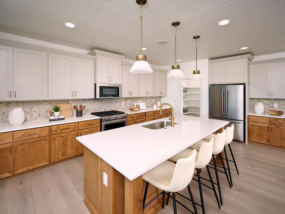 Representative Photo - Generous kitchen island provides a centerpiece for entertaining
