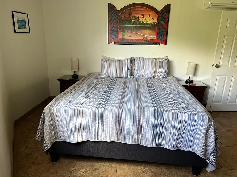 Guest bedroom with king size bed. Window has Haleakala Crater view (not pictured).