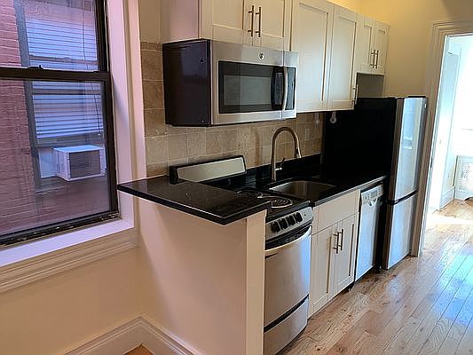 2nd image of 256 E 10th St APT 6E
