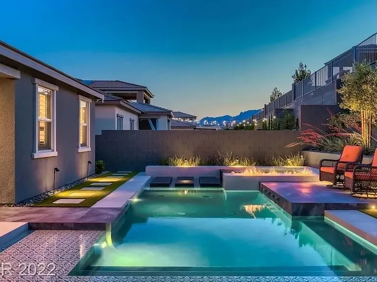 Evening view of pool and view of mountains.
