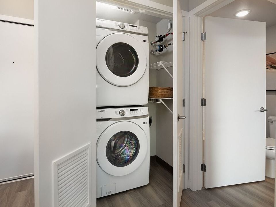 Stacking washer and dryer in every unit