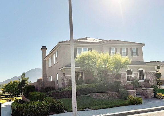 Serene side exterior offering privacy and views of the adjacent walking trial, no rear facing homes for added privacy.