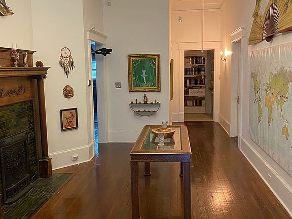 Receiving tea area w/ fireplace & hardwood floor