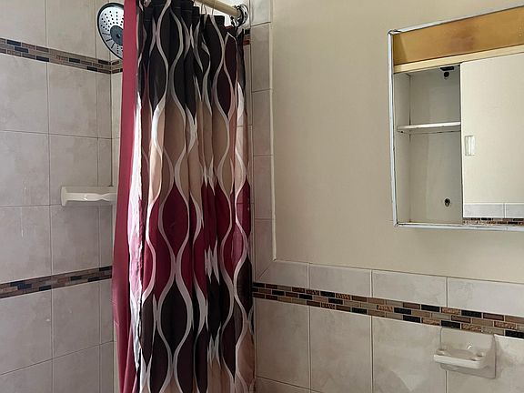 2nd image of 949 E 211th St APT 2
