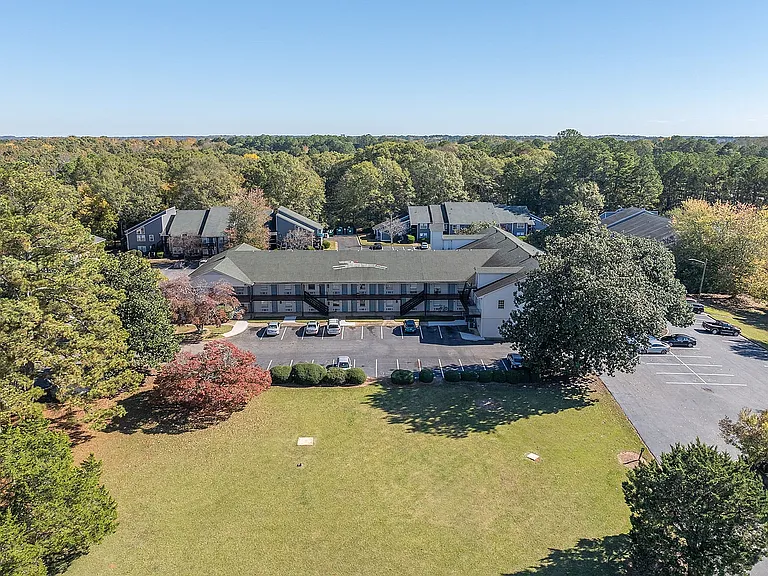Experience tranquility at this beautifully situated apartment complex, embraced by nature.