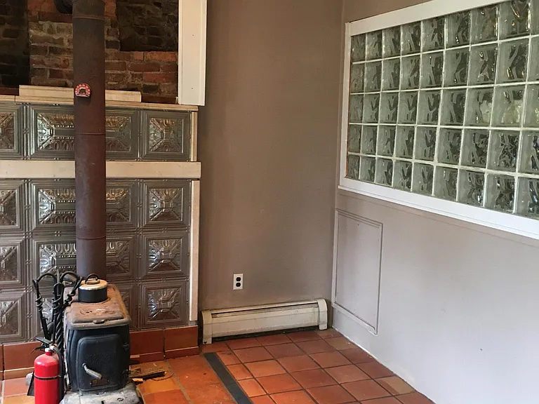 living room with wood stove