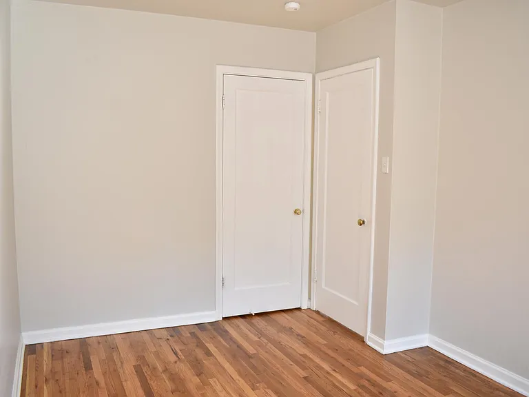 Hardwood throughout bedroom