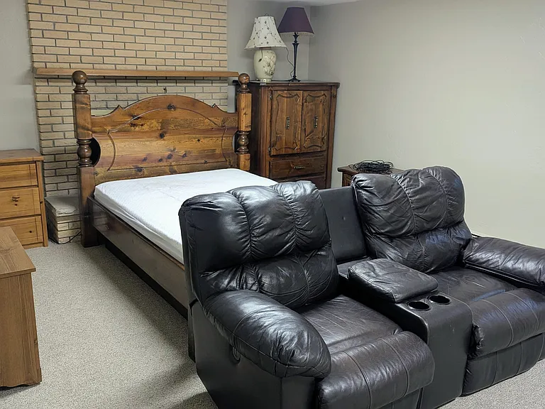 #1 Bedroom North with Queen post bed, matching dresser and nightstand, Theater recliners, Smart TV with soundbar.