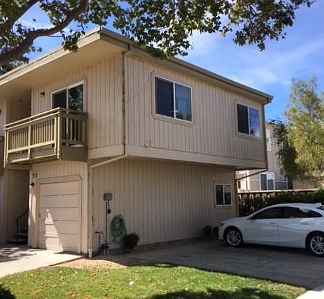 Exterior showing garage and additional parking