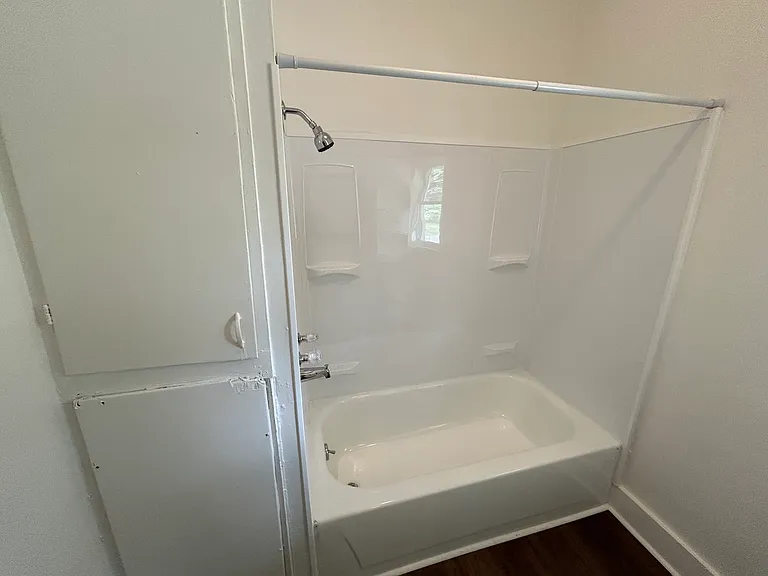 Bathroom with brand new shower surround