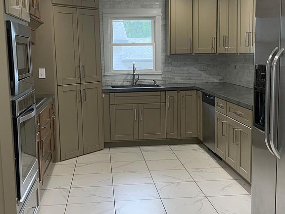 Kitchen with pantry door
