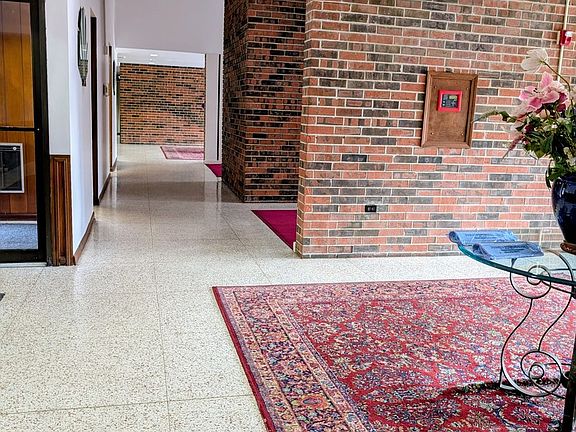 2nd image of 9558 Gross Point Rd #A-406