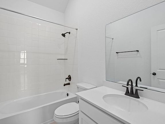Second bathroom showcasing the AW Collection Harmony with white cabinetry and contemporary finishes.