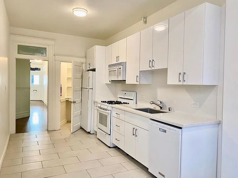 Newly renovated kitchen- new cabinets and appliances, D/W . great light!