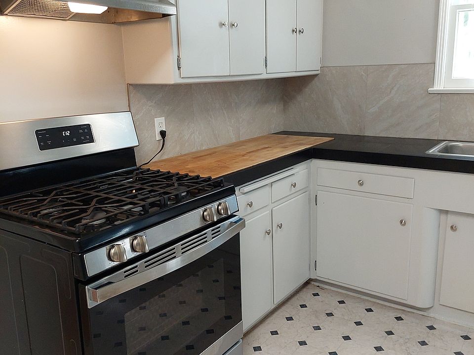 Kitchen with built-in cutting board