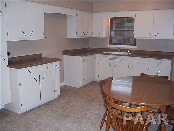 KITCHEN--ABUNDANCE OF FRESHLY PAINTED CABINETS, NEW COUNTERTOPS, SINK & FAUCET