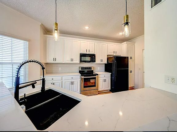 4th image of 15922 W 91st Ter #1