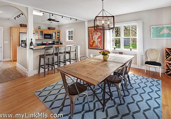 Spacious dining area that opens to front deck thru sliders