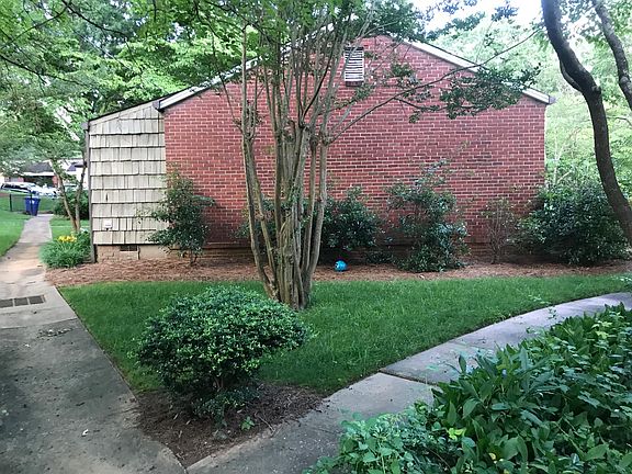 Side of the condo showing the walkway from front to back