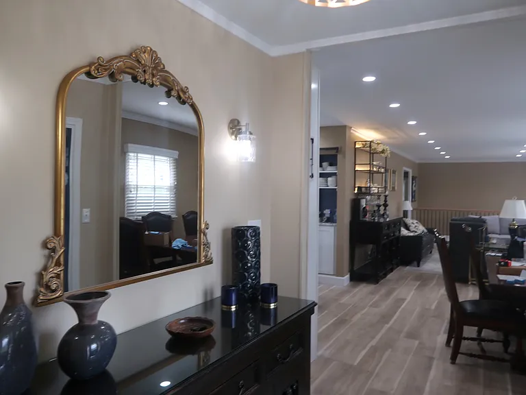 Front entry way leading to kitchen and living room