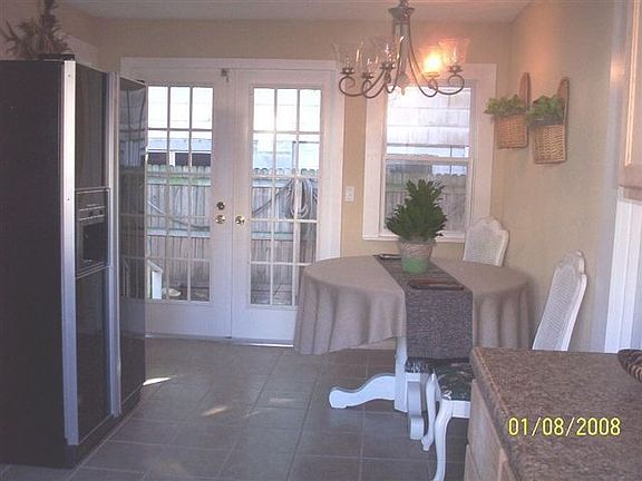 KITCHEN WITH VIEW OF PATIO AREA