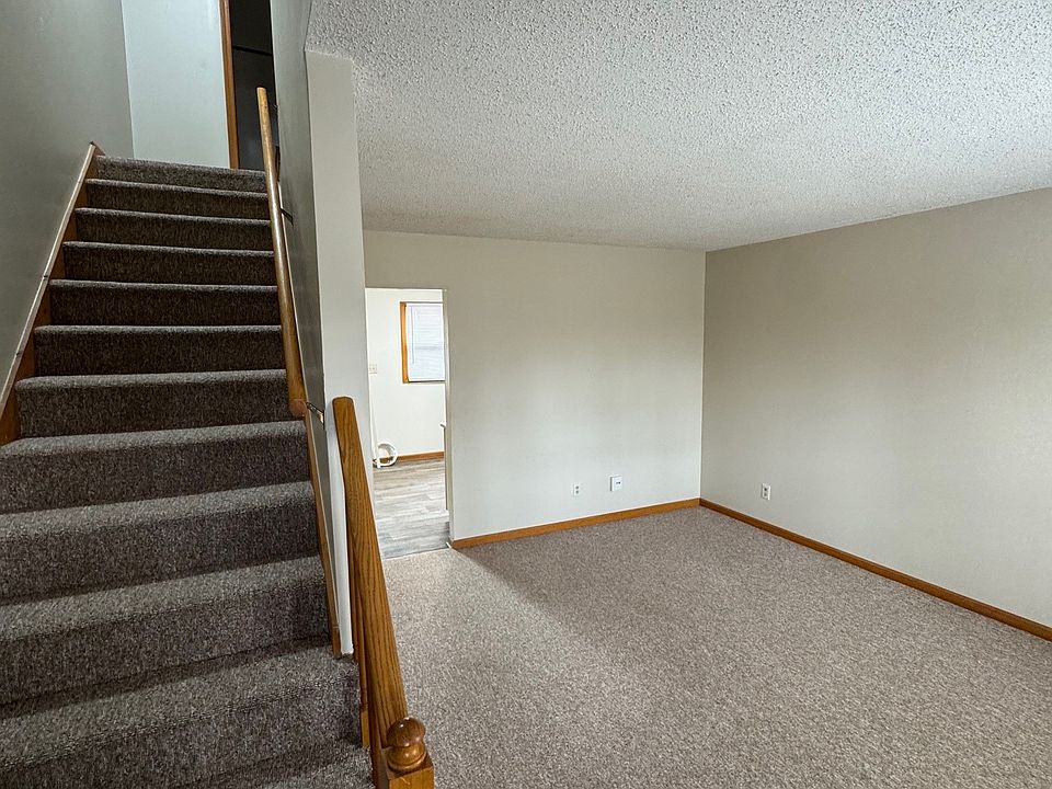 Front Entry, Stairwell and Living Room