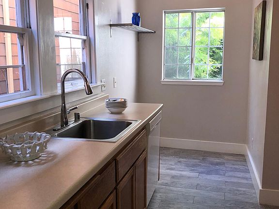 kitchen and kitchen nook with gas range