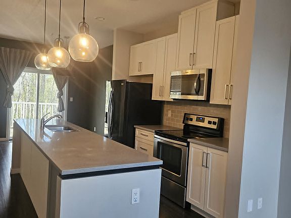 2nd image of 320 Secord Blvd NW Unit 31