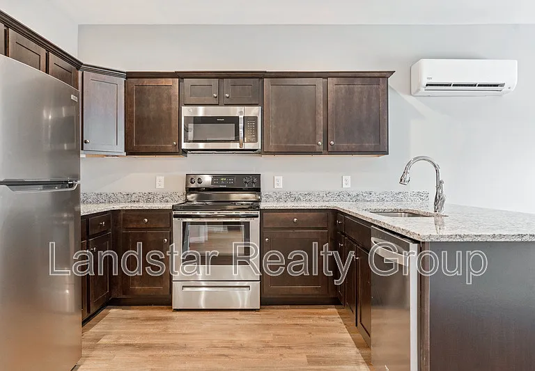 7310 Tiger Way #102 — Photo 10