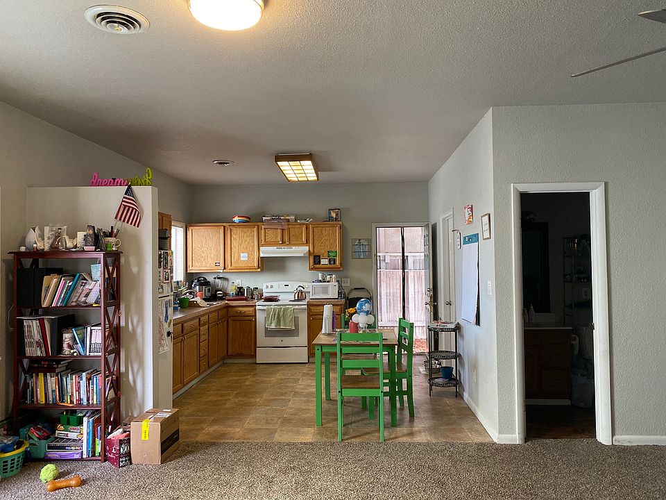 View of eat-in kitchen. Also, view of bathroom entrance.