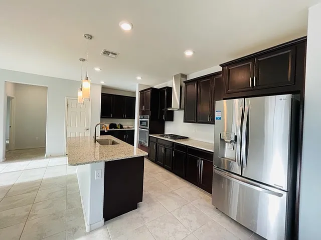 8597 N Genoa Ct — Photo 17
