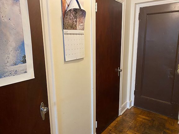 Front hallway with two closets