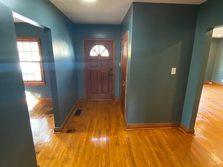 Entry way - looking at the front door from the kitchen opening.