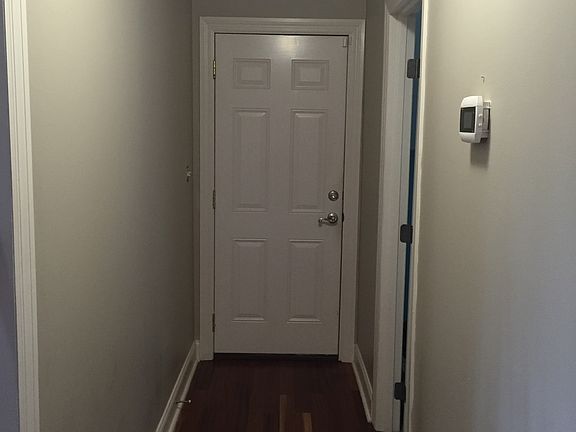 Hallway leading to garage