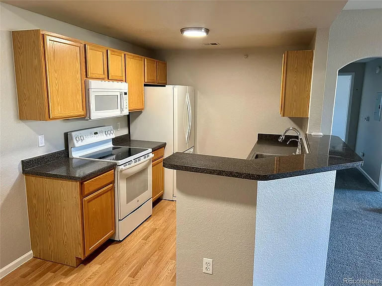 7440 S Blackhawk St #203 — Photo 6
