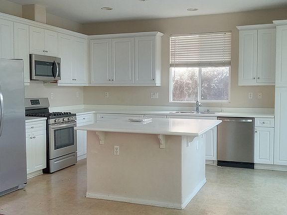 middle island kichen with new remodeled floor.