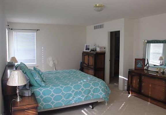 Master bedroom with lots of windows
